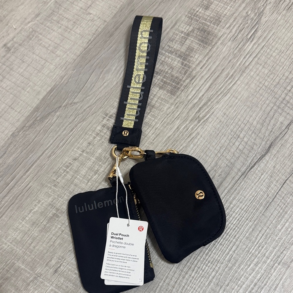 lululemon athletica Black and Gold Wristlet